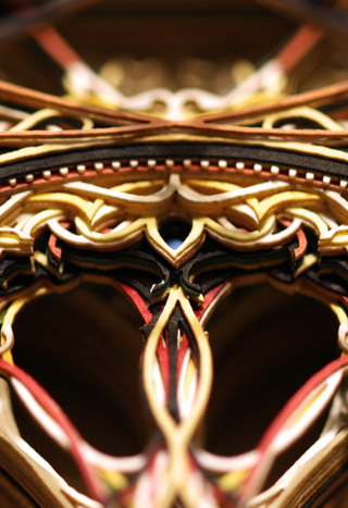 Illustration for article titled Incredibly beautiful windows made from stacked laser-cut paper